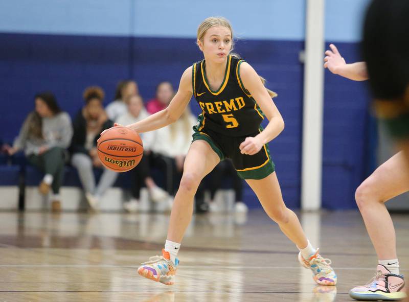 Fremd's Ellie Thompson (5) looks for an opening during the girls varsity basketball game between Fremd and Nazareth on Monday, Jan. 9, 2023 in La Grange Park, IL.