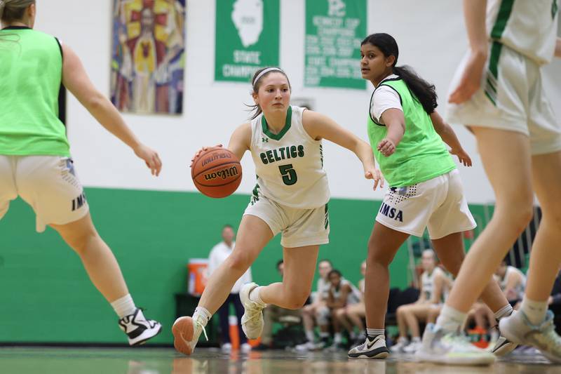 Providence’s Sydney Spencer drives to the paint against IMSA in the Class 3A Providence Regional Semifinal on Tuesday, February 14th.