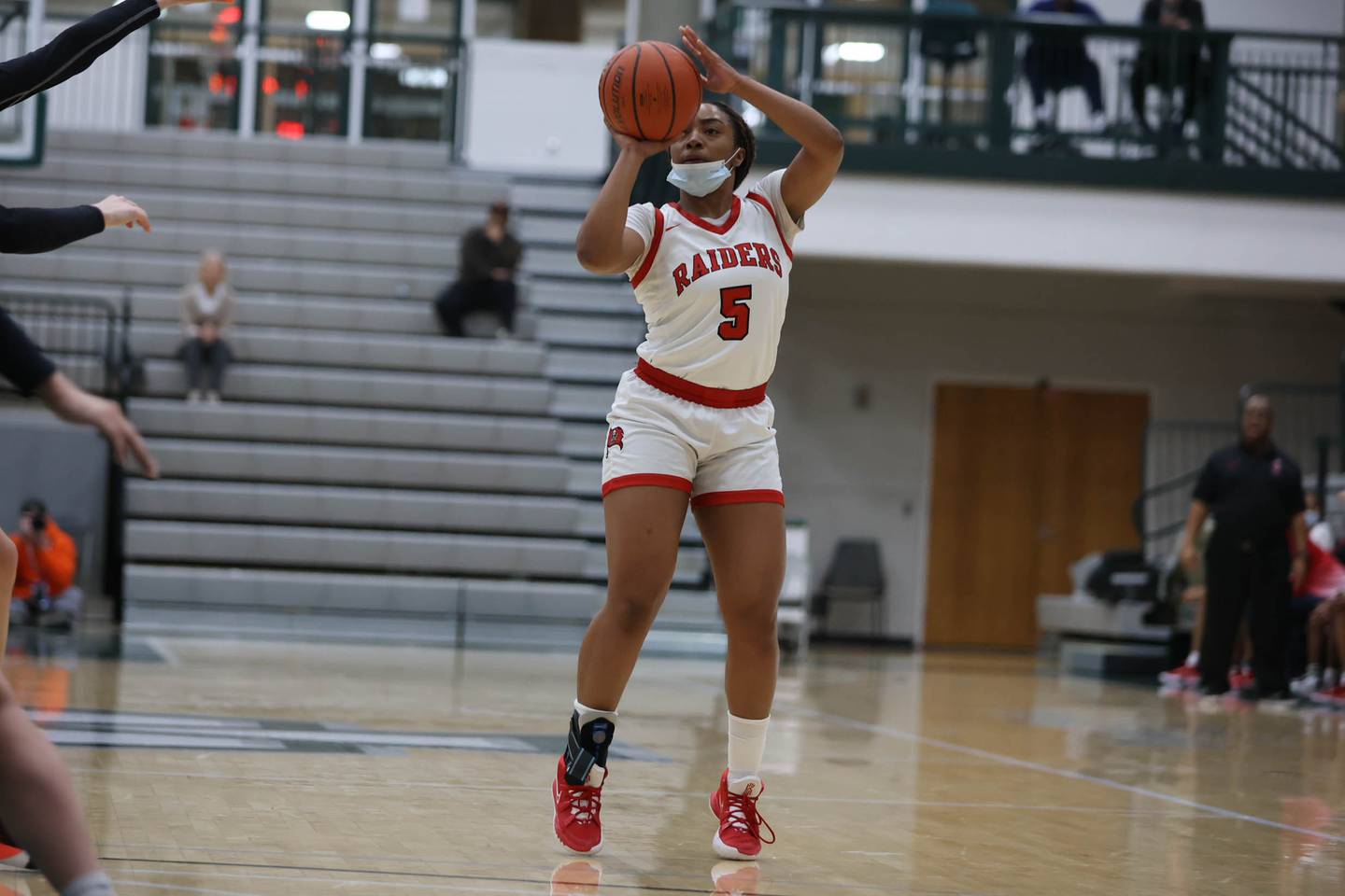 Bolingbrook’s Kennedi Perkins puts up the deep shot against Edwardsville in the Class 4A Illinois Wesleyan Super-sectional. Friday, Feb. 25, 2022, in Bloomington.