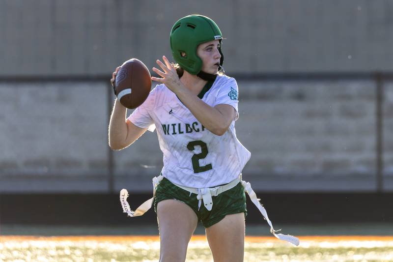 Plainfield Central's Alyssa Link looks for an open teammate during a varsity flag football Romeoville Regional semifinal game against Bradley-Bourbonnais at Romeoville on Oct. 7, 2025.