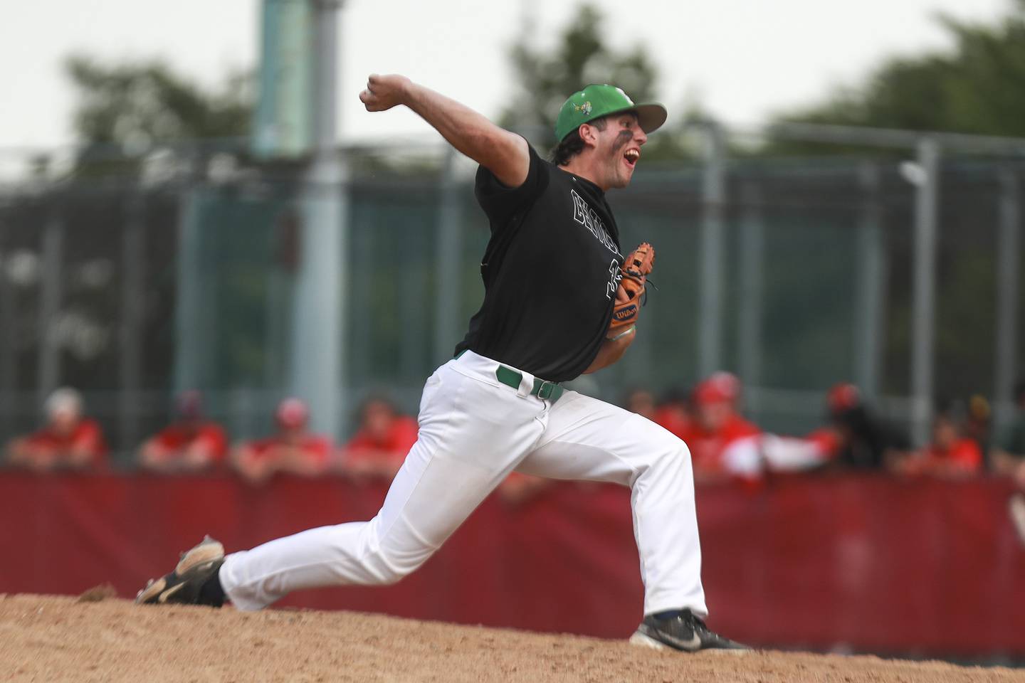 Providence Catholic closer Jack Wajda winds up on Friday, June 11, 2021, at Homewood-Flossmoor High School in Flossoor, Ill.