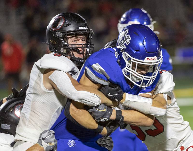 Newman’s Brady Williamson fights for yards against Orion Friday, Sept. 20, 2024, at Roscoe Eades Stadium in Sterling.