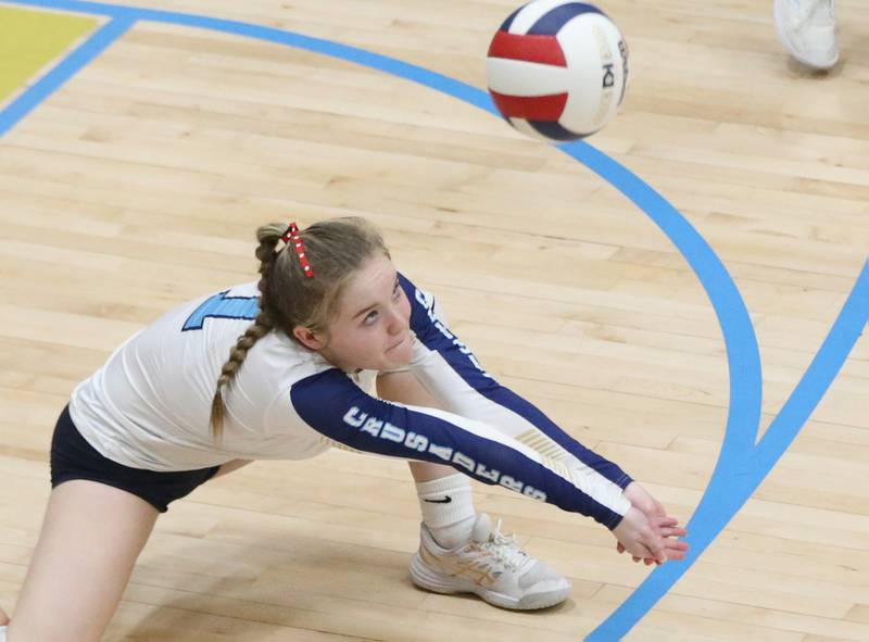 Marquette's libero Emma Rinearson returns a serve from Hall on Monday, Sept. 25, 2023 at Bader Gym.