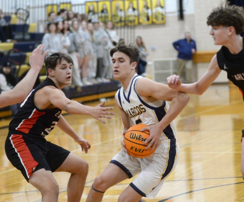 Polo's Gus Mumford (5) drives the lane against Earlville on Monday, Feb. 10, 2025 at Polo High School.