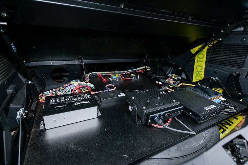 Deputy Police Chief Matt Dean shows the $20K worth of electronic equipment that is in each squad car, that would benefit from being stored in a garage to limit the exposure to extreme heat and cold while not in use. A $59.4 million public safety referendum for a new police station will be on the March 17, 2026 primary ballot.