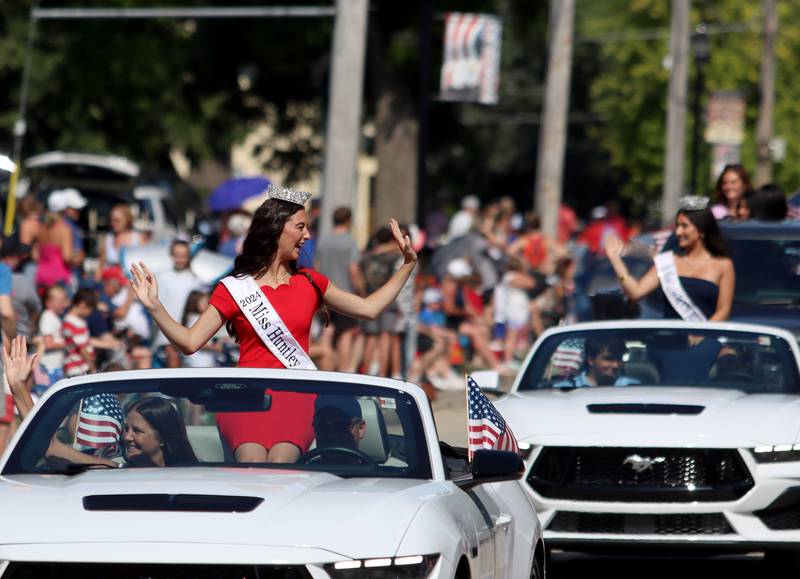 Miss Huntley 2024 Katie Mitchell waves during the Huntley Independence Day Parade along Main Street in Huntley on Friday, July 4, 2025.