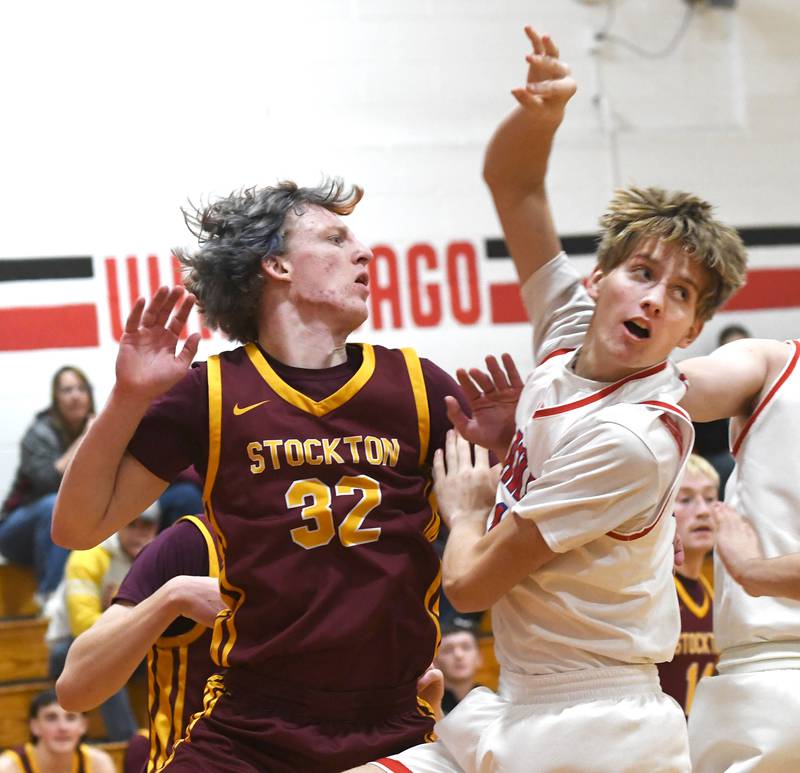 Oregon's Dreyk Withers (11) and Stockton's Ari Zink (32) fight for position on Saturday, Dec. 13 at the 64th Annual Forreston Holiday Basketball Tournament held at Forreston High School.