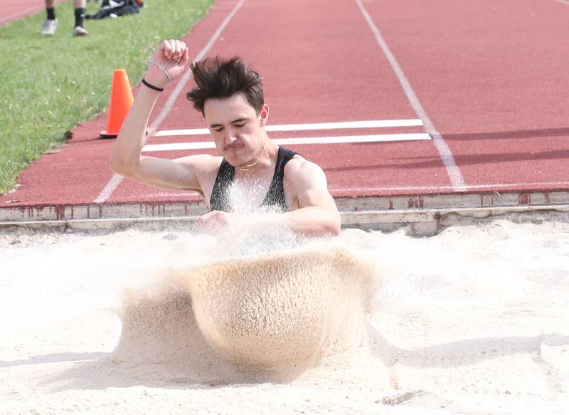 Plano's Tristan Meszaros does the long jump during the I-8 Boys Conference Championship track meet on Thursday, May 11, 2023 at the L-P Athletic Complex in La Salle.