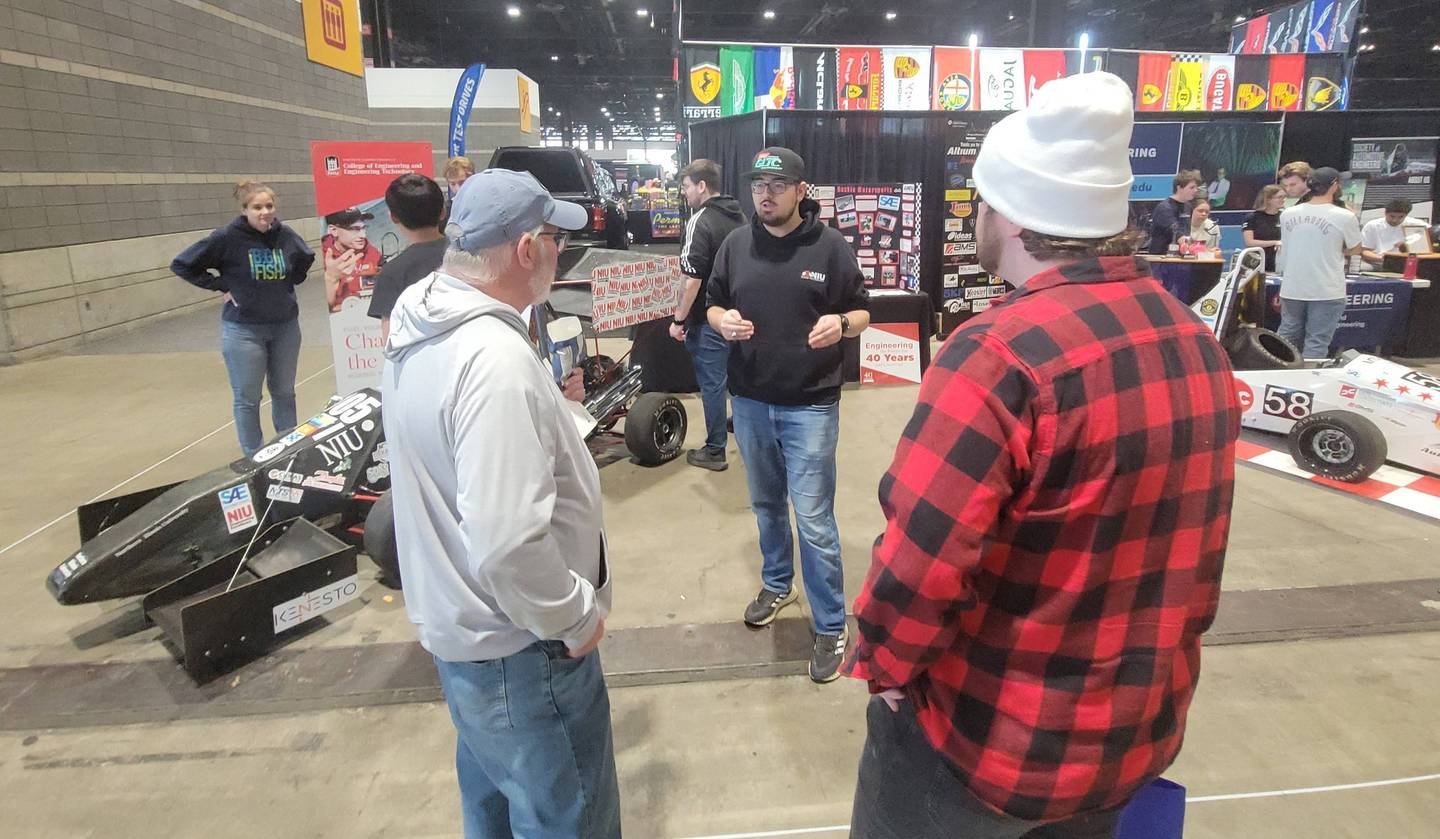 NIU Huskie Motorsports vice president Abid Alnafoosi speaks to visitors at the Chicago Auto Show on Feb. 6, 2026.