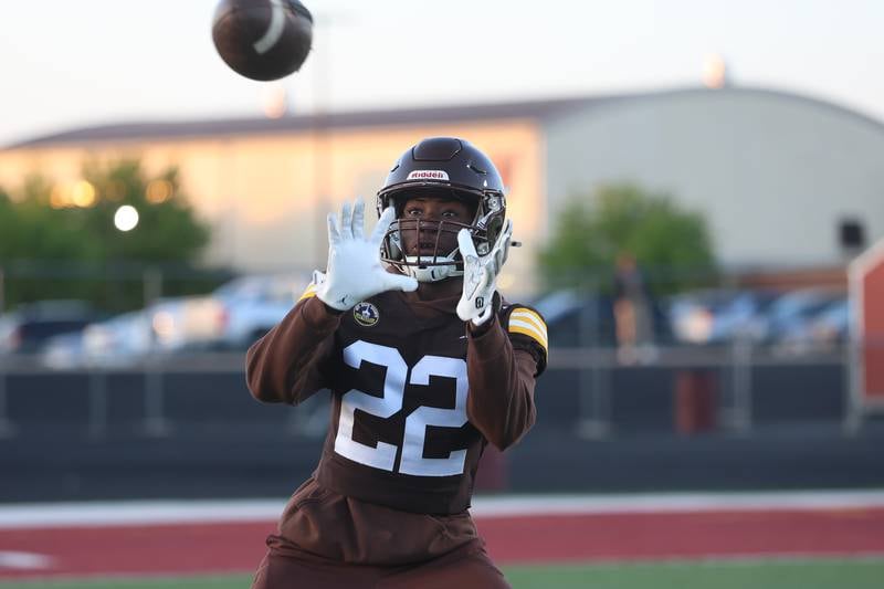 Joliet Catholic’s Jeremiah Smith pulls in a pass at the IHSA Southwest Suburb Showcase combine on Thursday, May 7, 2026 at Plainfield North High School.
