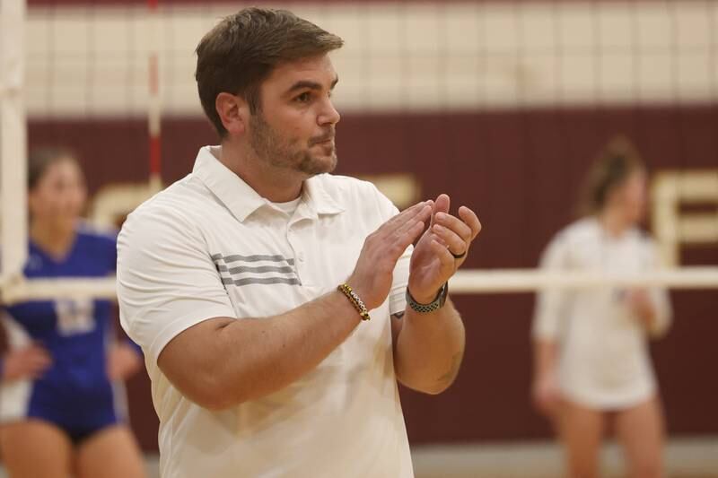 Joliet West head coach Christopher Lincoln cheers on his team against Sandburg in the in the Class 4A Lockport Sectional title match on Wednesday.