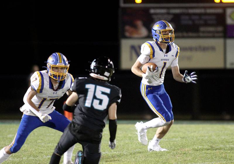 Johnsburg’s AJ Bravieri runs the ball in varsity football on Friday Sept. 27, 2024, at Woodstock North High School in Woodstock.