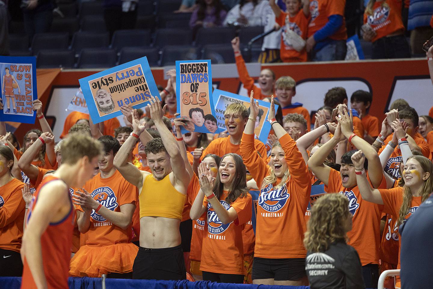 Eastland fans celebrate the Cougar’s win over Peoria  Christian Thursday, March 13, 2025, during the Class 1A boys basketball state semifinal.