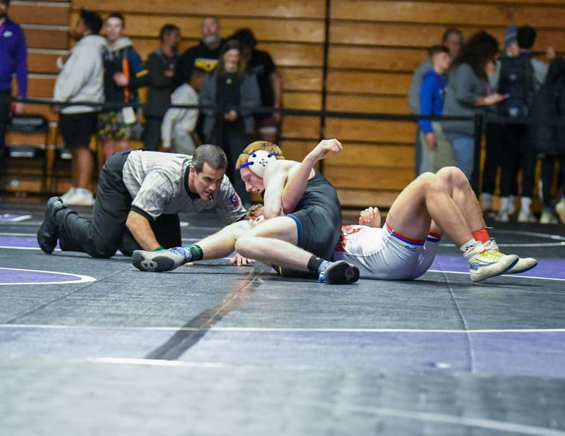 Jackson Gillen of Yorkville Christian pins his Orgon opponent in the 170 weight class during the championship match on Saturday Dec. 10th during the Plano Reaper wrestling classic held at Plano High School.