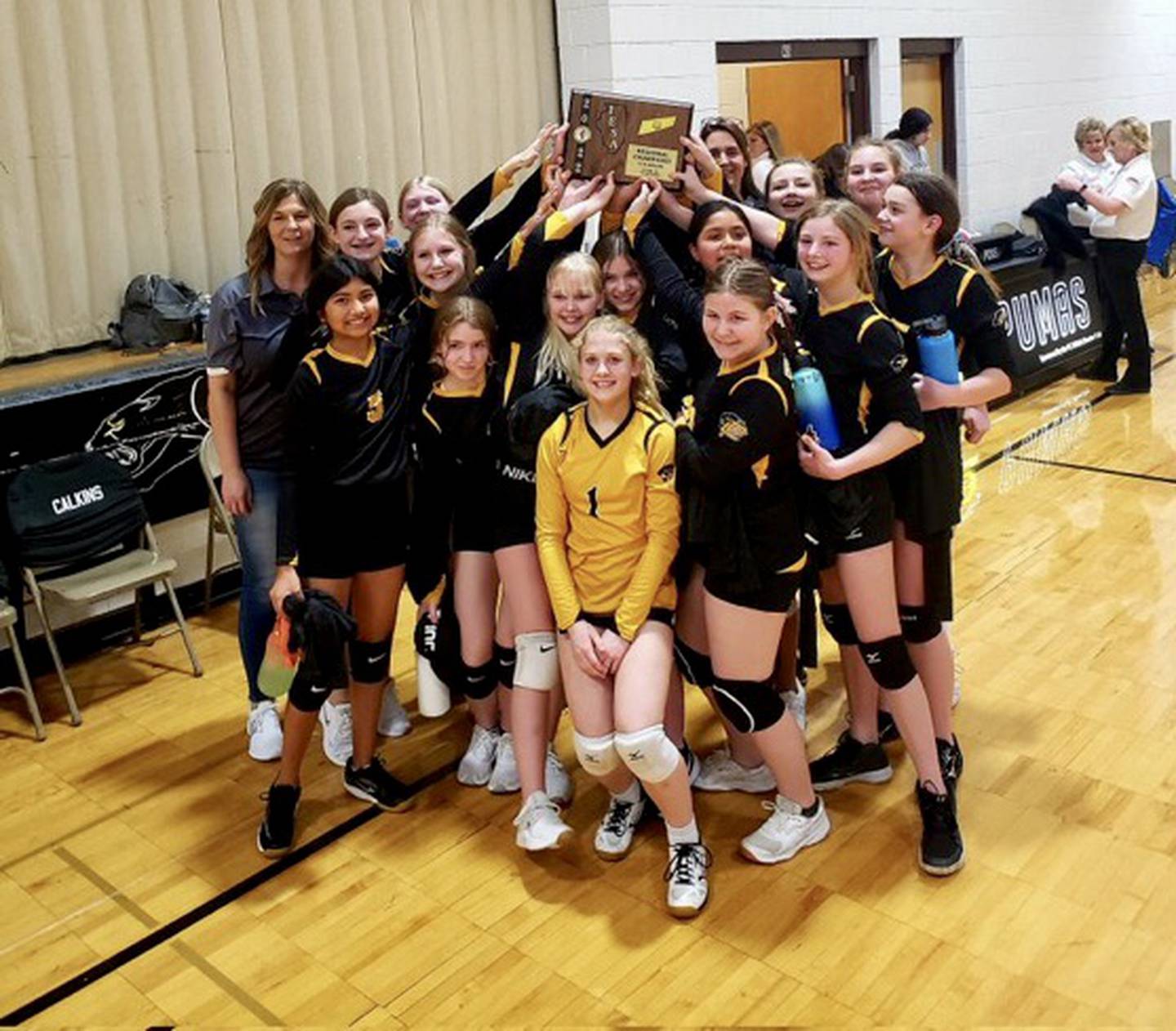The Putnam County Junior High 7th grade volleyball team celebrate their first regional championship. The Lady Pumas advance to the Sectional Championship at 6:30 p.m. Monday, March at Brimfield.