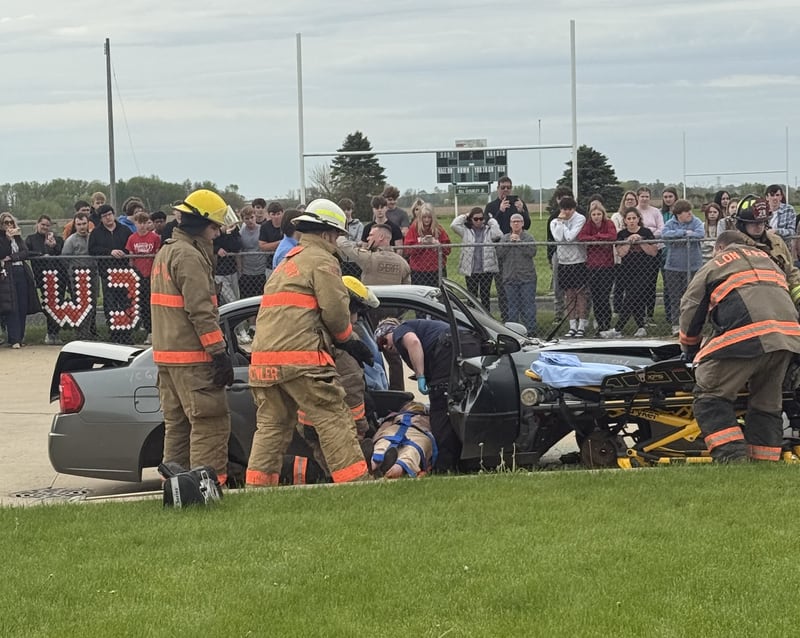 First responders tend to a mock crash scenario Wednesday, April 30, 2025, during an Operation Prom event at Woodland School in rural Streator.