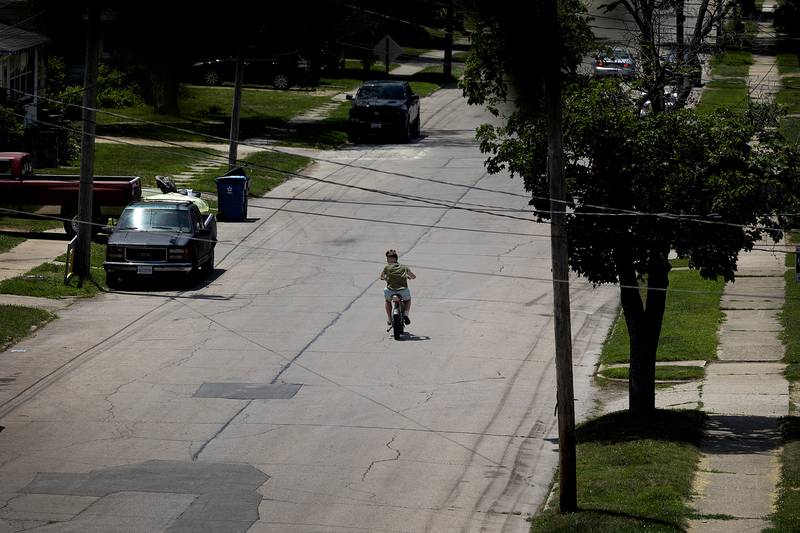 A rider heads west on Second Street in Dixon on Tuesday, June 17, 2025. The gas-powered bikes have become a public safety concern, Dixon city officials say.
