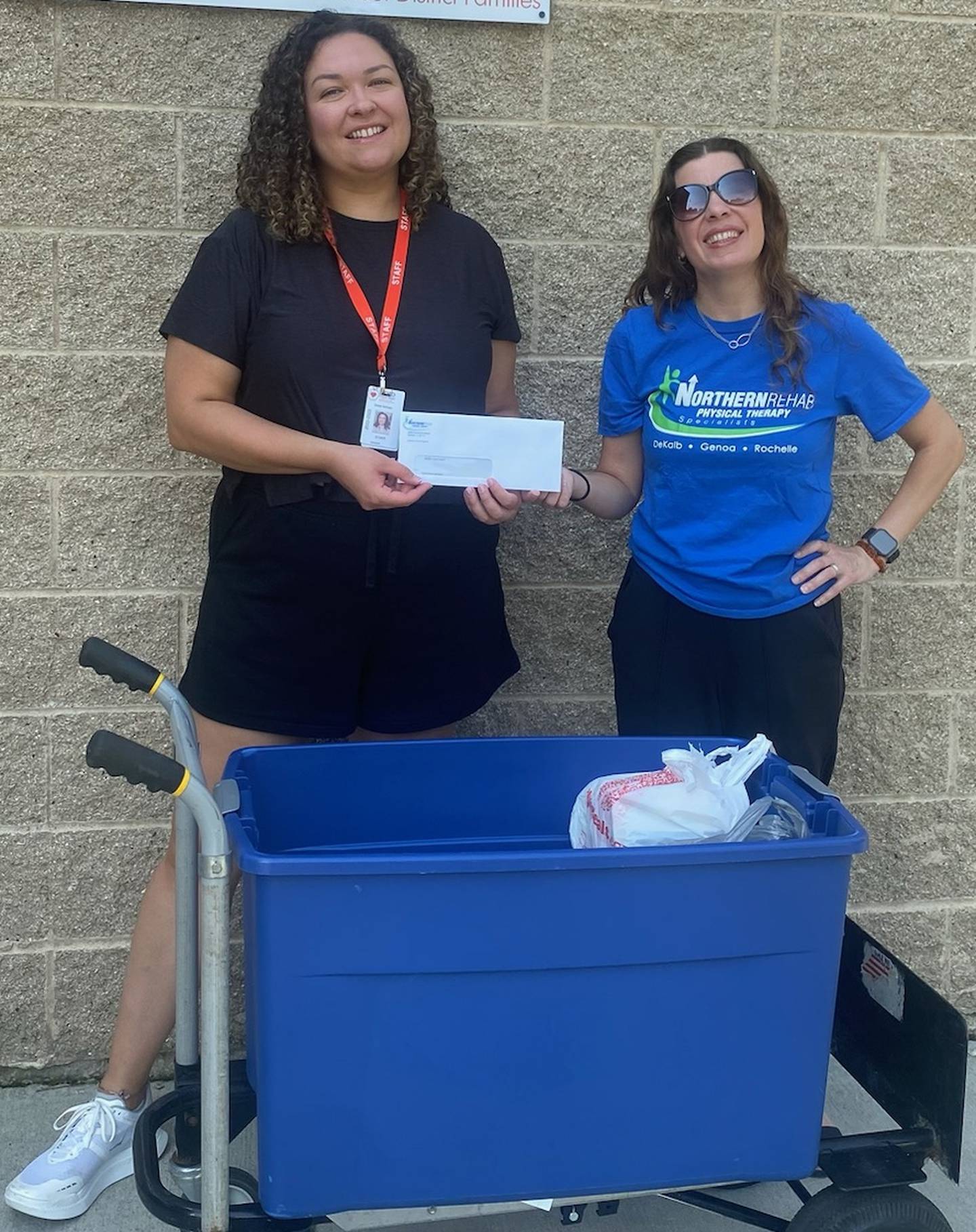 Northern Rehab physical therapist Kristin Christian delivering Barb Food Mart donations