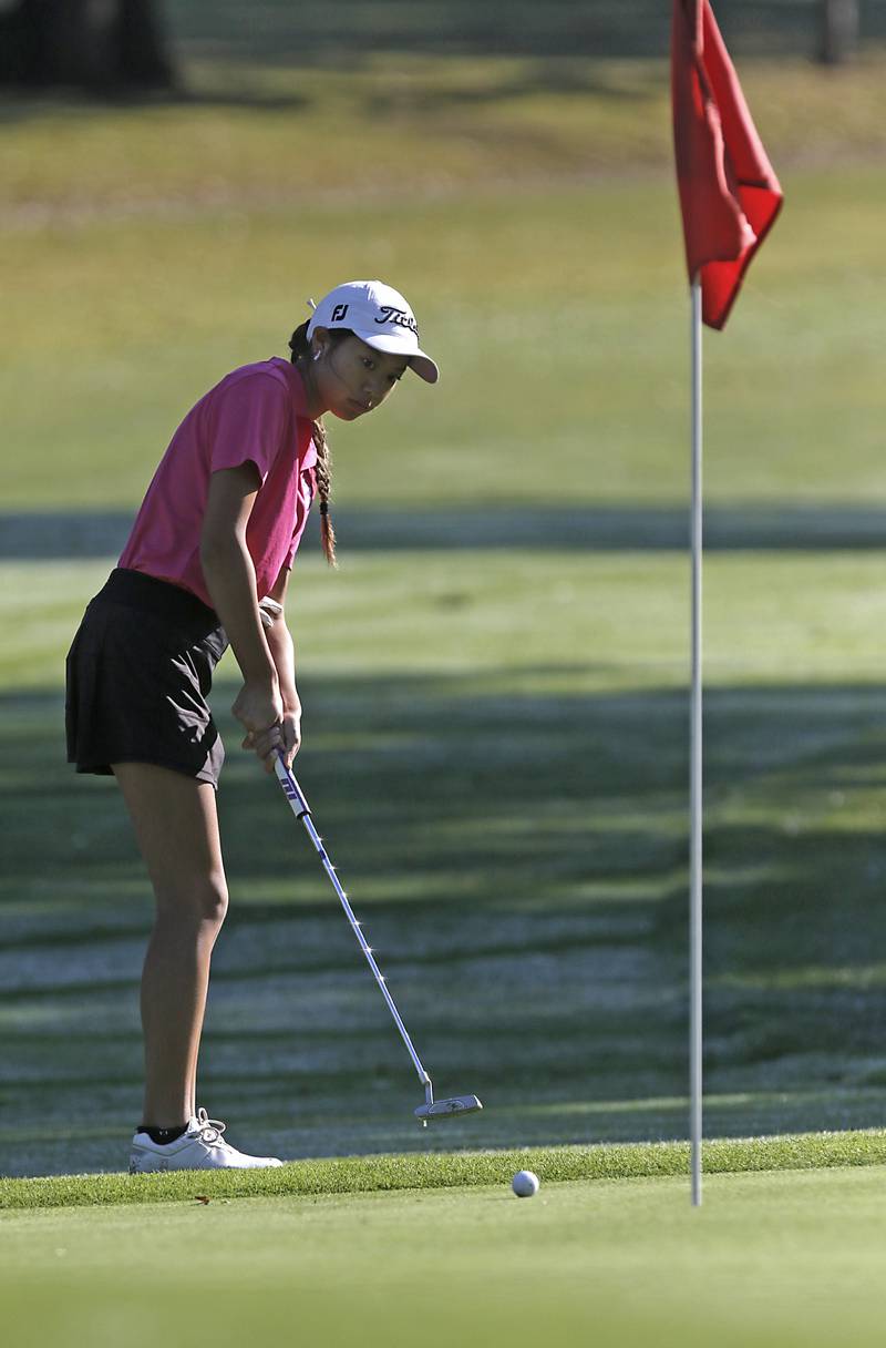 Hampshire’s Kaylee See putts not eh 10th green during the Fox Valley Conference Girls Golf Tournament Wednesday, Sept. 25, 2024, at Crystal Woods Golf Club in Woodstock.