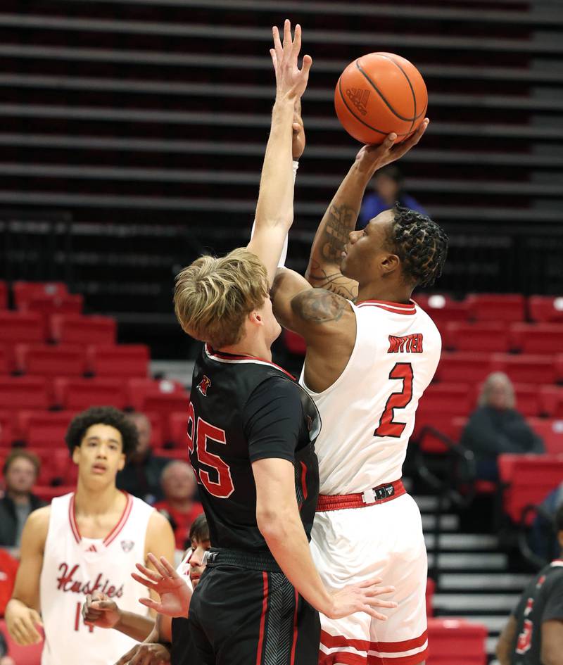 Northern Illinois' Zarique Nutter shoots over Illinois Tech's Andrew Veon during their game Monday, Nov. 13, 2023, at the NIU Convocation Center in DeKalb.