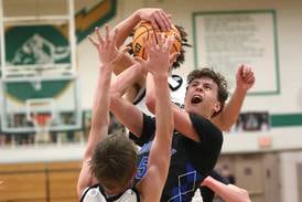 Josiah Mitchell, Marcus Johnson, smothering Sycamore defense lead to regional title over Woodstock