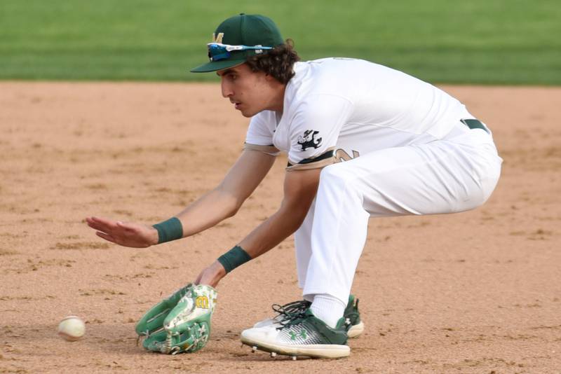 Bishop McNamara's Preston Payne fields a grounder during a home game against Marian Central Friday, Aprul 17, 2026.