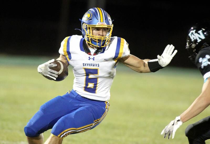 Johnsburg’s Brett Centnarowicz runs the ball in varsity football on Friday Sept. 27, 2024, at Woodstock North High School in Woodstock.