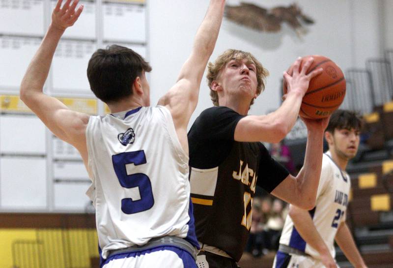 Jacobs’  Max Fessler takes a shot against Lake Zurich in Hinkle Holiday Classic boys basketball tournament game action at Jacobs High School Tuesday.