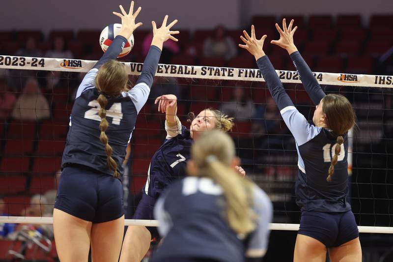 IC Catholic’s Delilah Hyland hits a shot against Mater Dei in the Class 2A Volleyball Championship match on Saturday, Nov. 11, 2023 in Normal.