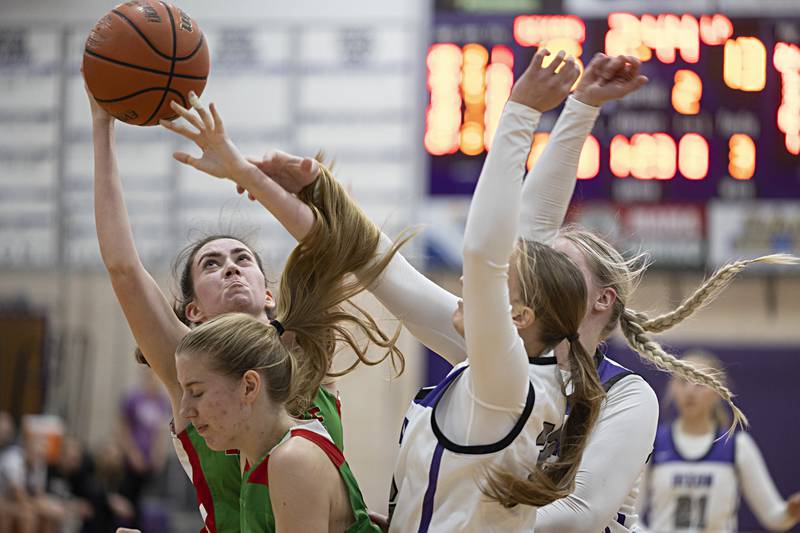 LaSalle-Peru’s Bailey Pode pulls down a rebound against Dixon Thursday, Nov. 30, 2023 in Dixon.