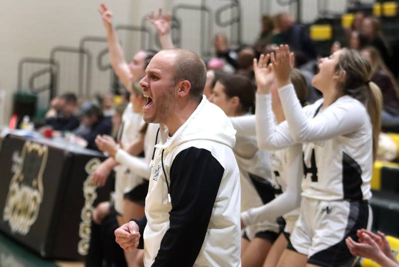 Kaneland’s Head Coach Brian Claesson and the Knights get revved up as they build a second-half lead in IHSA Class 3A Regional Title Game girls basketball action on Friday, Feb. 21, 2025, at Crystal Lake South High School in Crystal Lake.