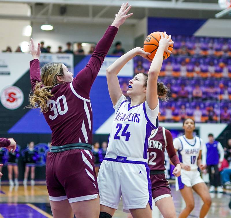 Plano's Chloe Rowe (24) shoots the ball in the post against Marengo’s Macy Noe (30) during a basketball game at Plano High School on Wednesday, January 29, 2025.