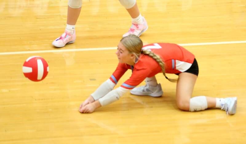 Ottawa libero Kendall Biba digs the ball from the floor against L-P on Thursday, Oct. 17, 2024 in Kingman Gym at Ottawa High School.
