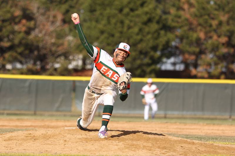 Plainfield East’s Christian Mitchelle delivers a pitch against Downers Grove North. Friday, April 1, 2022, in Plainfield.