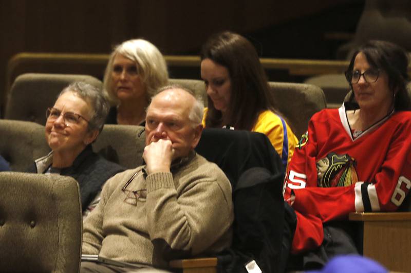 People watch as student compete in the McHenry County Regional Office of Education 2023 Spelling Bee Wednesday, March 22, 2023, at McHenry County College's Luecht Auditorium in Crystal Lake.