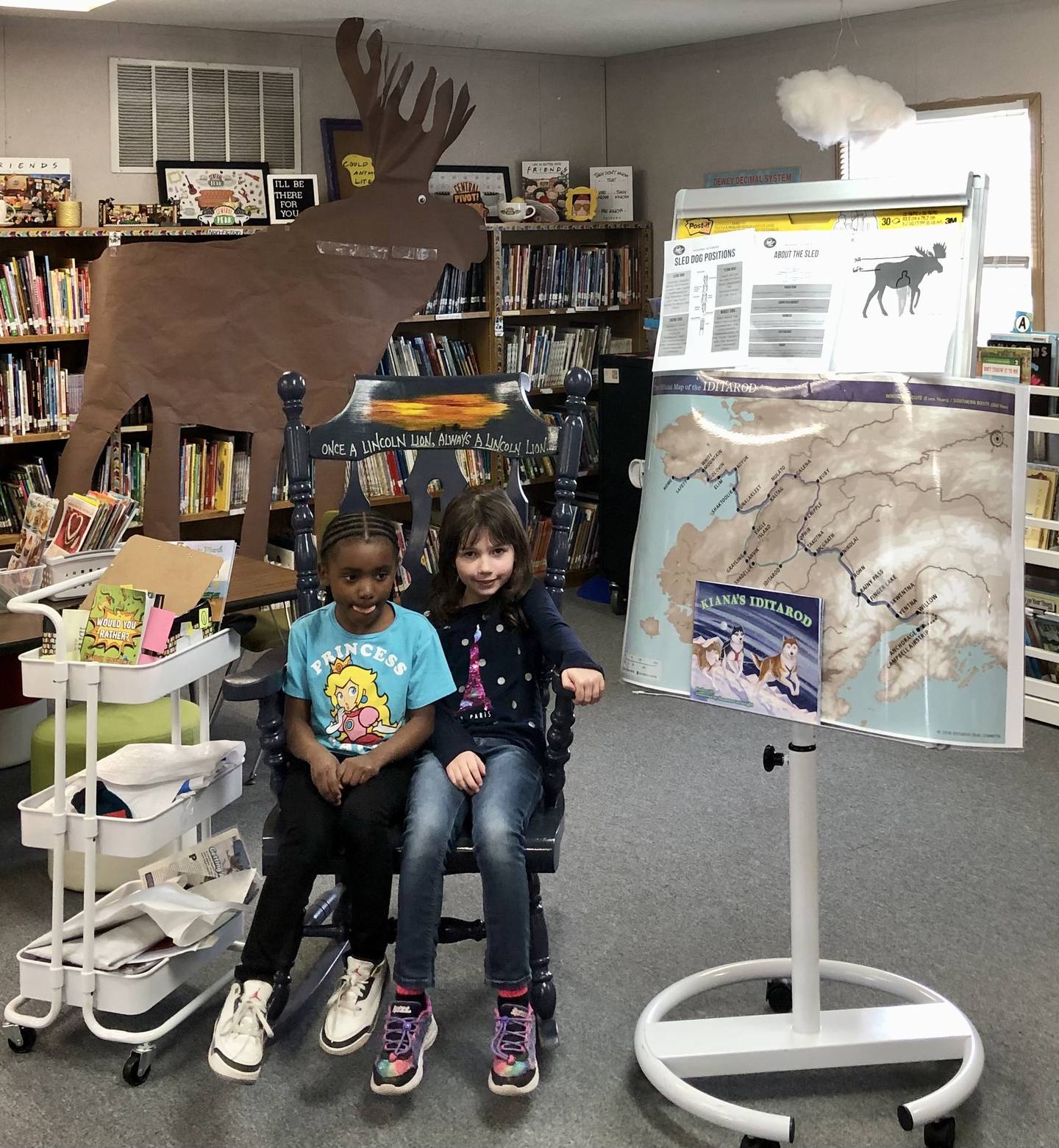 Lincoln Elementary School students learn about the Alaskan Iditarod in March 2025, part of special programming coordinated by teachers who saw the race in person at a conference in Anchorage, Alaska. Students enjoyed specialized library time and got to interact with dogs as part of the lessons.