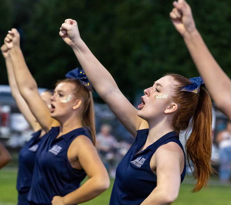 Marquette cheerleader Maera Jimenez cheers from the sidelines at Gould Stadium.