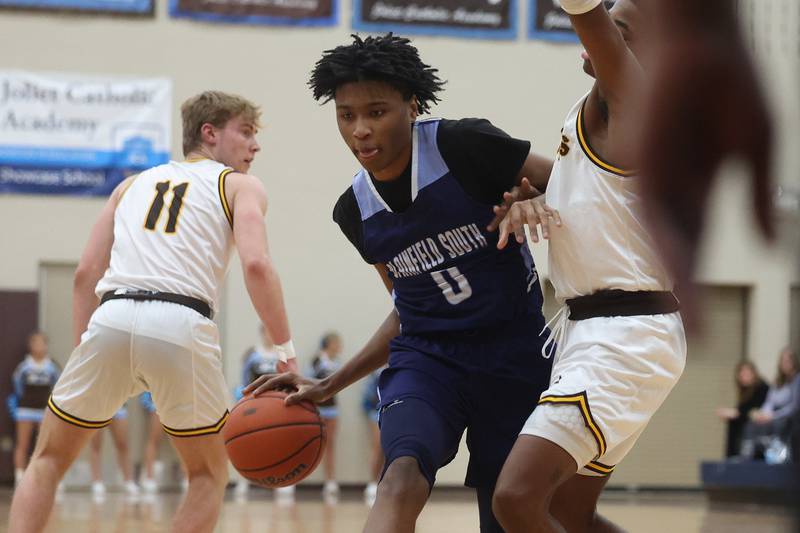 Plainfield South’s Kareem Parker makes a move against Joliet Catholic on Wednesday, Jan. 17th, 2024 in Joliet.