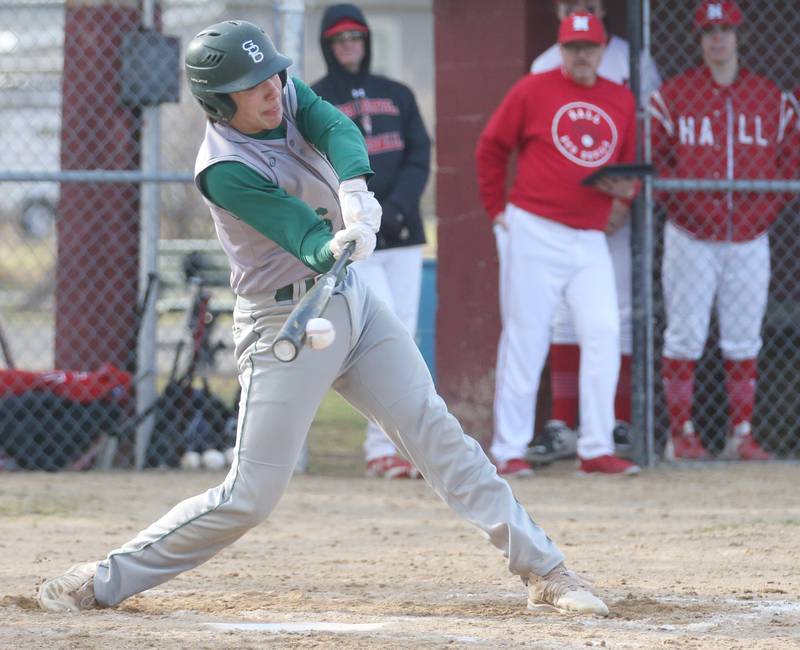 St. Bede's Nathan Husser hits the ball against Hall on Monday, March 27, 2023 at Kirby Park in Spring Valley.