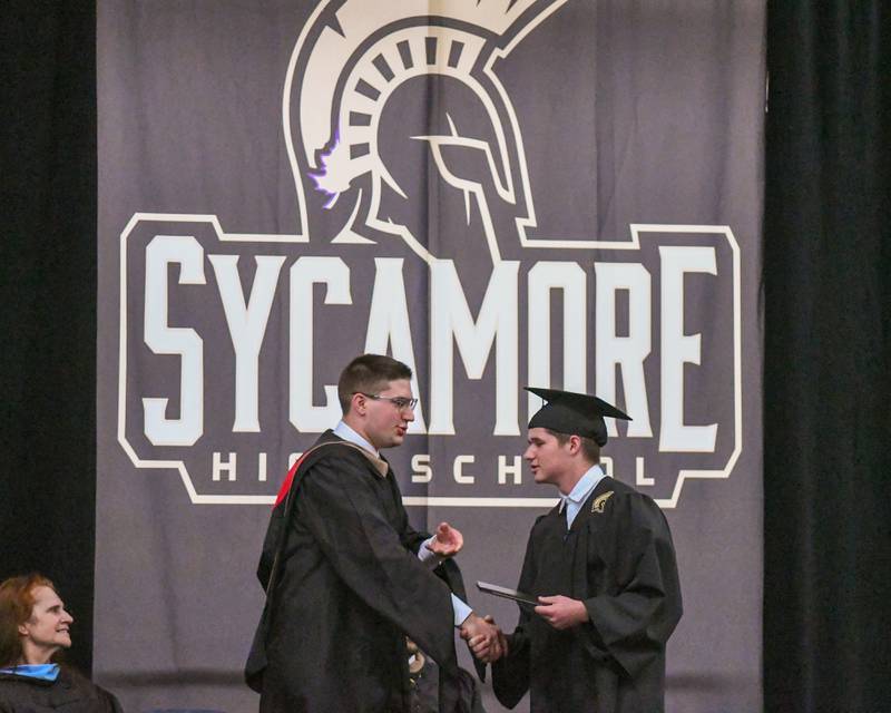 A Sycamore graduate receives his diploma on Sunday May 24, 2026, during the graduation ceremony held at Sycamore High School.