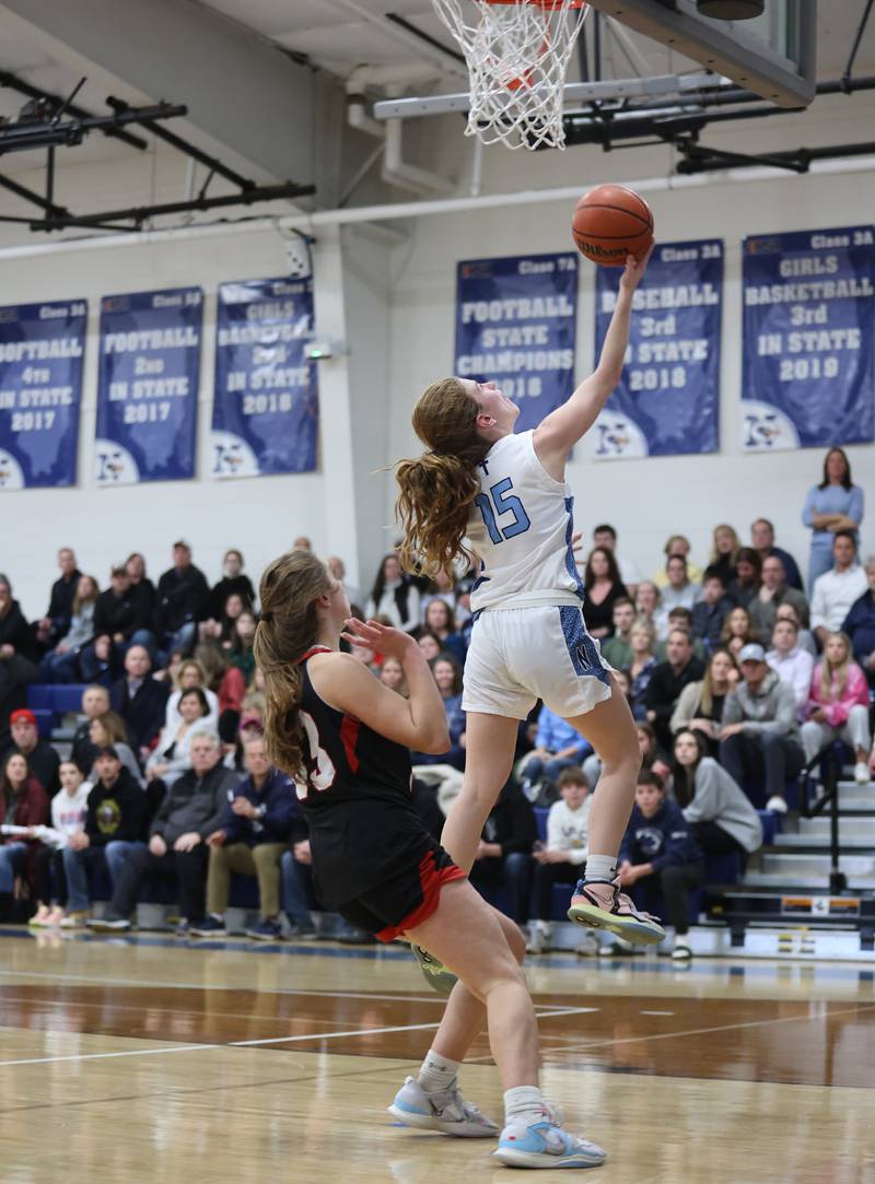 Nazareth's Mary Bridget Wilson (15) lays up during the girls varsity basketball game between Benet and Nazareth academies on Wednesday, Jan. 3, 2023 in La Grange Park, IL.