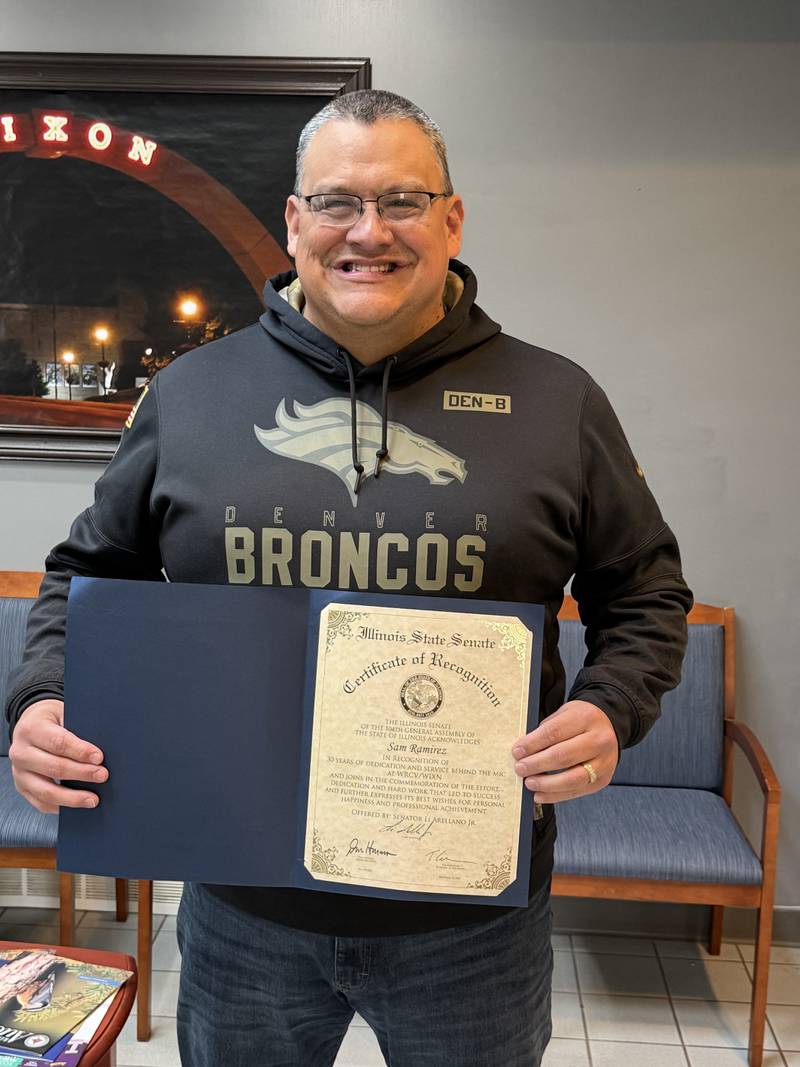 Sam Ramirez, program director of Dixon’s WIXN 95.1 and 1460 AM, River Country 101.7 and The Rock 95.7, received a certificate of recognition from the Illinois State Senate for his three decades behind the mic.