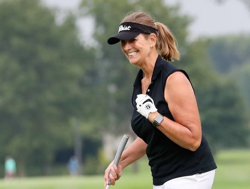 Kirsten McLendon celebrates after beating Karen Anderson in a three-hole playoff to win the Illinois Valley Women's Golf Invitational on Sunday at Spring Creek Golf Course in Spring Valley.