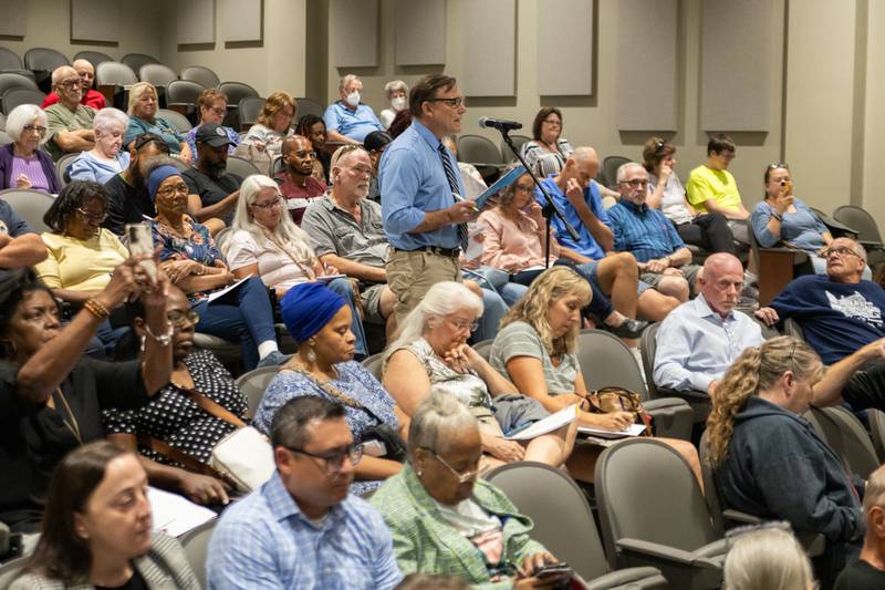 Citizens Utility Board Director of Communications Jim Chilsen delivers a public comment on behalf of his organization at an Illinois Commerce Commission hearing in August. CUB intervened in Aqua’s rate case to argue for reductions to the company’s proposal.