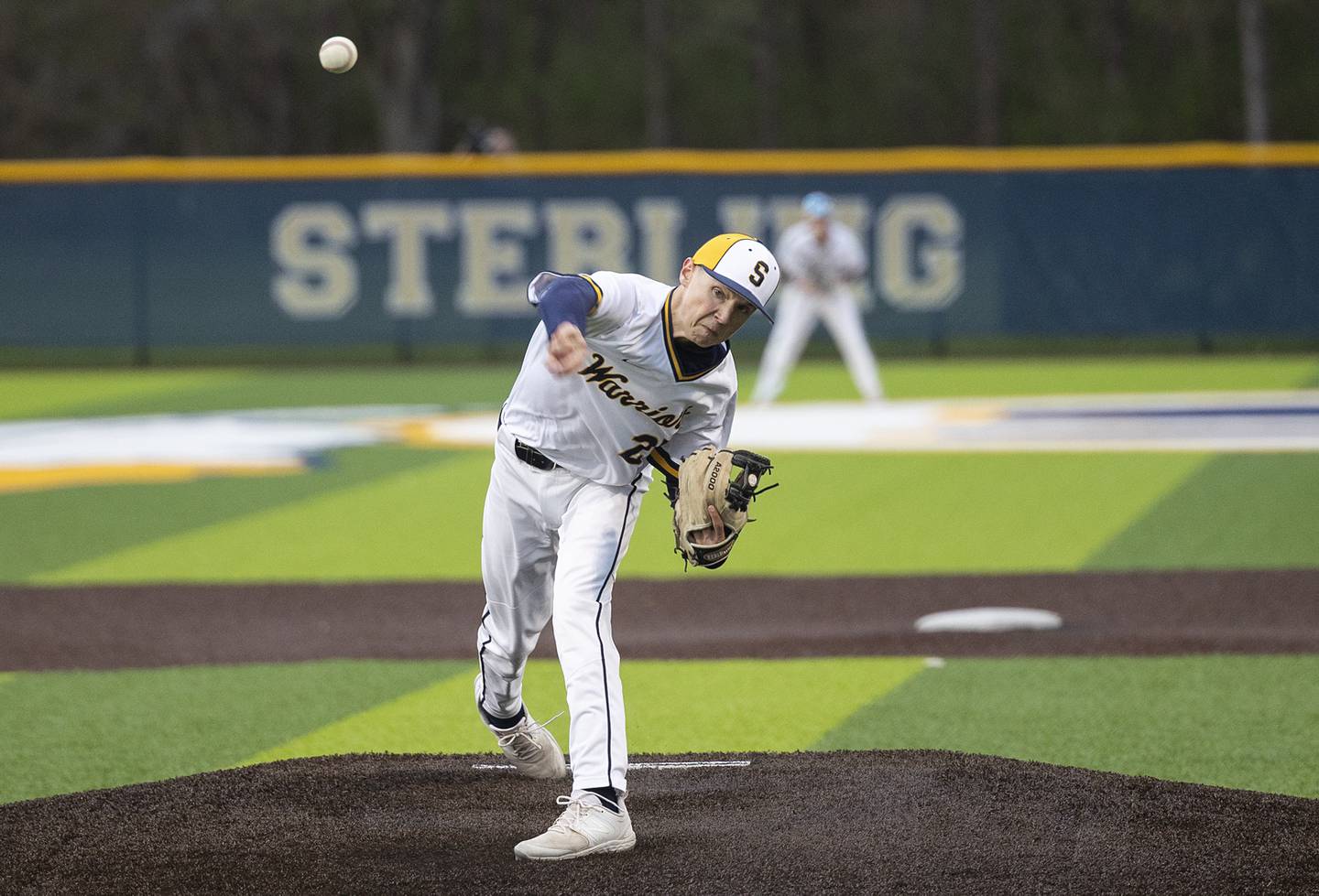 Sterling’s Bryce Hartman fires a pitch against Hall Wednesday, April 17, 2024 at Gartner Park in Sterling.