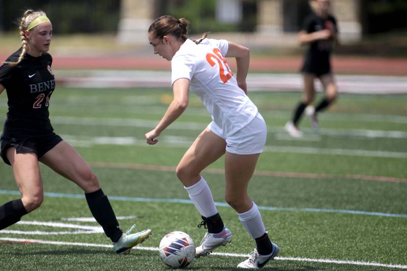 Crystal Lake Central’s Jillian Mueller (right) gets the ball away from Benet’s Anna Casmere during a Class 2A girls state soccer semifinal at North Central College in Naperville on Friday, June 2, 2023.