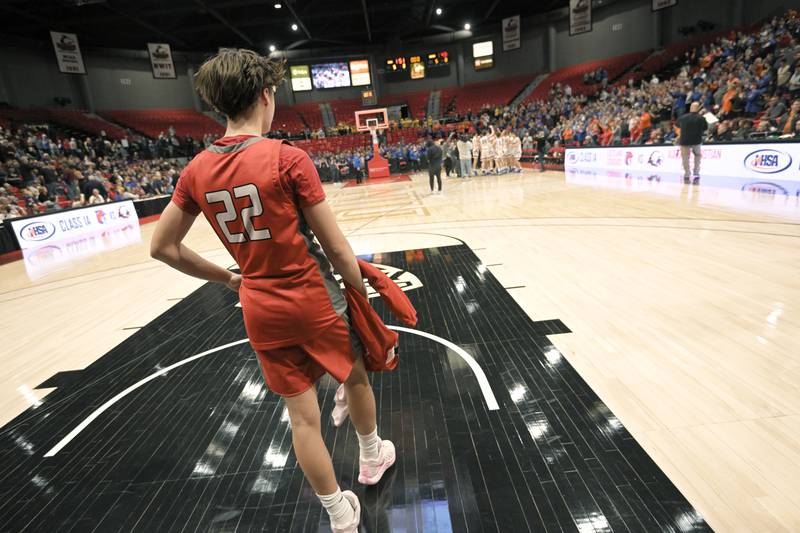 Aurora Christian’s Jacob Baumann watches as Eastland celebrates their victory in a IHSA Class 1A boys basketball supersectional at Northern Illinois University in DeKalb on Monday, Mar. 10, 2025.