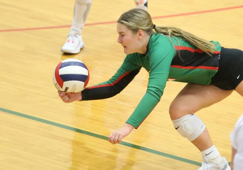 L-P's Emma Jereb saves the ball against Kaneland in AJ Sellett Gymnasium on Thursday, Oct. 24, 2024 at L-P High School.