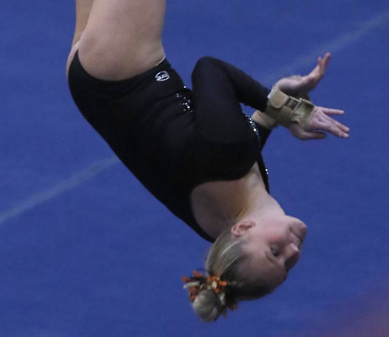DeKalb's Leah Benson competes in the preliminary round of the floor exercise Friday, Feb. 17, 2023, during the IHSA Girls State Final Gymnastics Meet at Palatine High School.