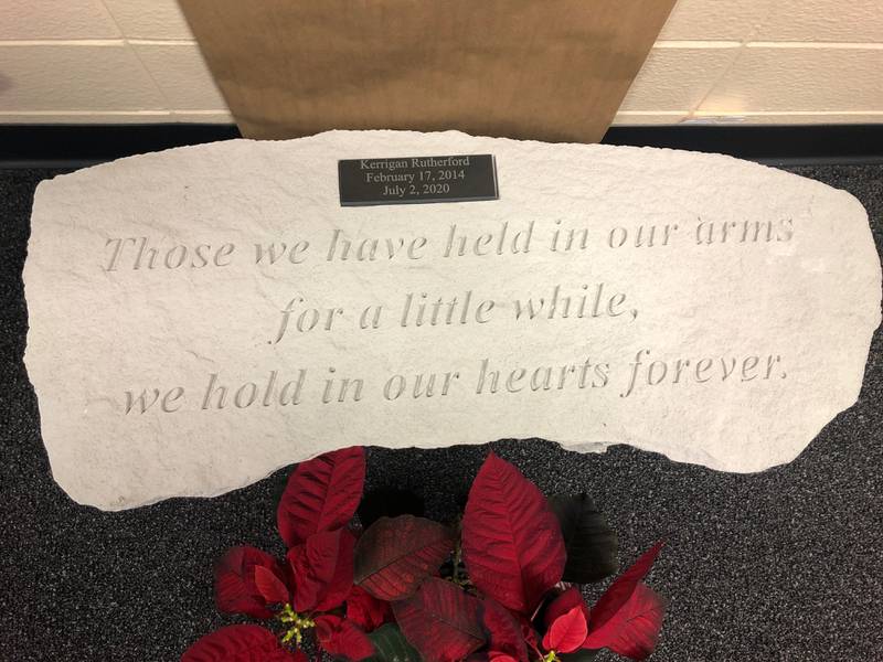 A bench commemorating six-year-old Kerrigan Rutherford sits at Boulder Hill Elementary School. (Courtesy of Brianna McKinley)